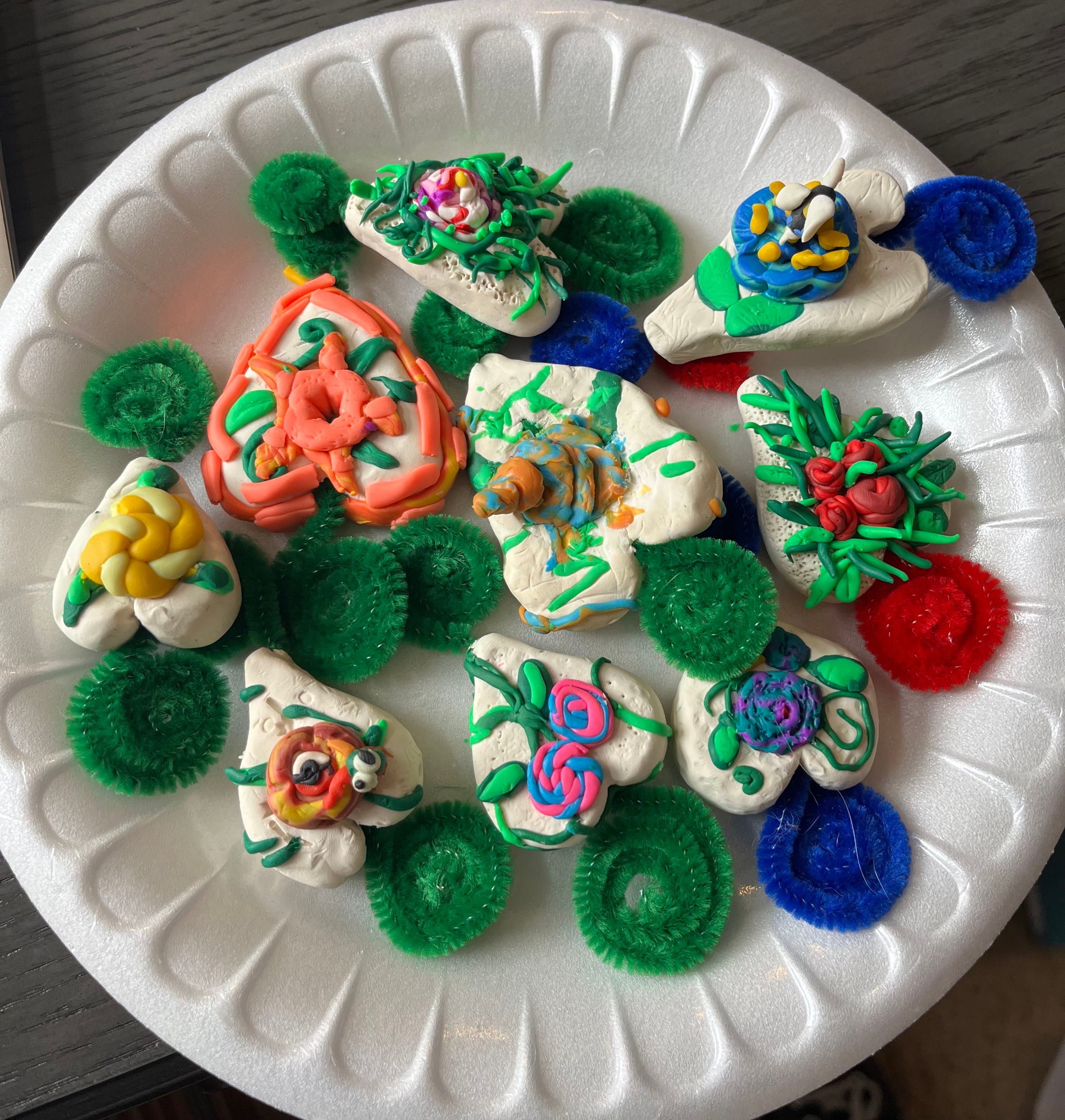 1. Alt text: "Plate of colorful cookies and flowers, adding a touch of vibrancy and sweetness to any occasion." 2. Alt text: "Delightful plate of cookies and flowers, a feast for the eyes with a burst of colors and natural beauty." 3. Alt text: "A plate adorned with vibrant cookies and flowers, a visual treat that combines sweetness and nature's charm."